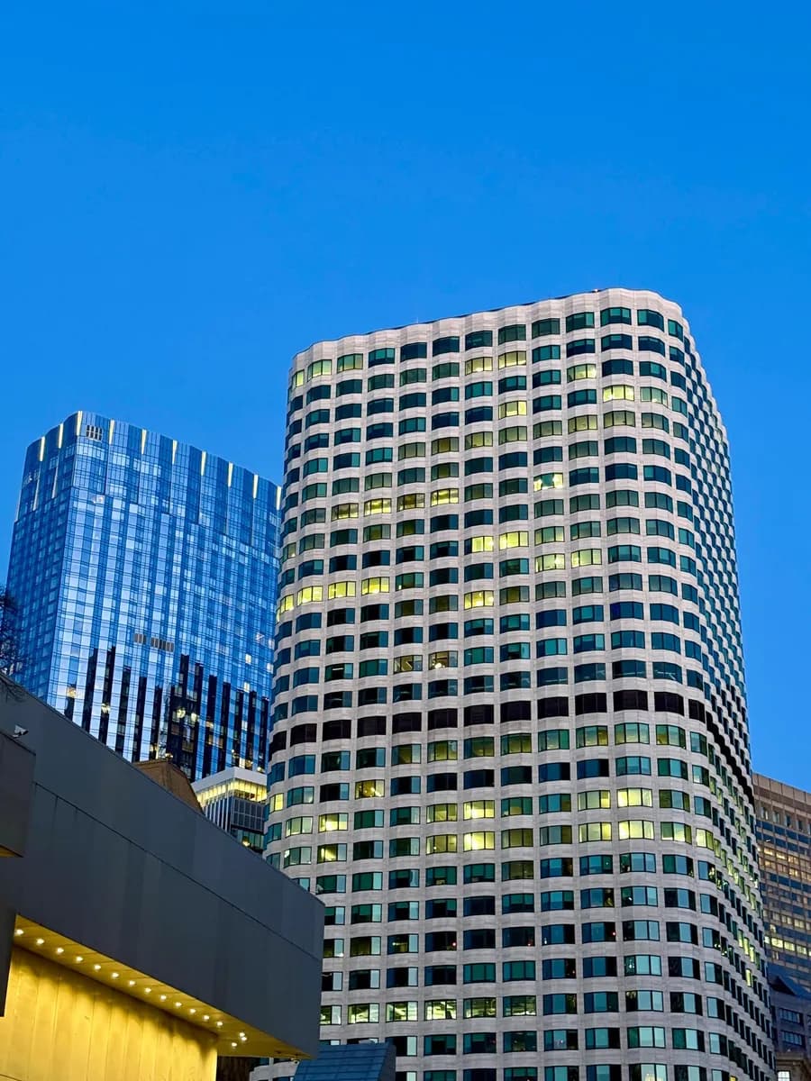 Stunning view of Boston's Financial District skyscrapers set against a clear evening sky