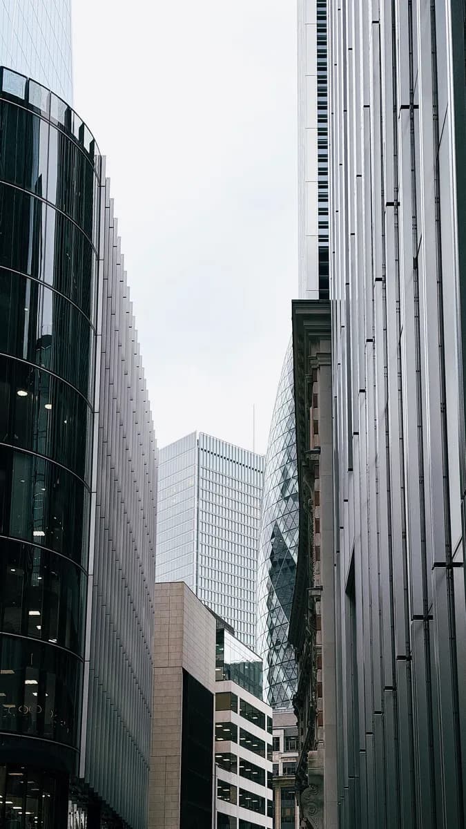 View of modern skyscrapers and The Gherkin in London's financial district.