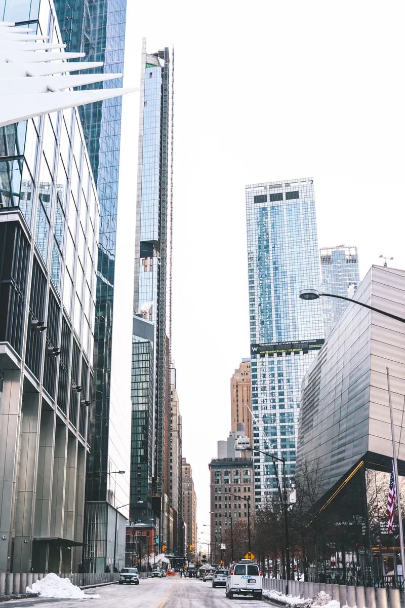 Captivating view of New York City's financial district with towering skyscrapers and wintery streets